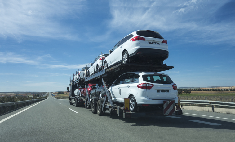 How Enclosed Vehicle Transport Protects Cars From Weather Conditions